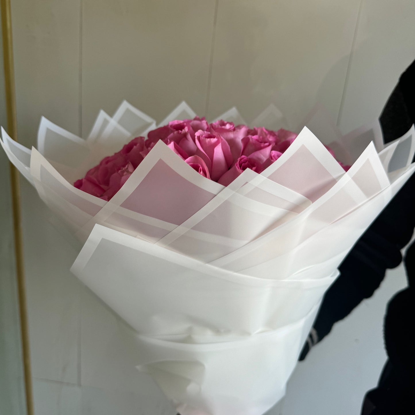 pink rose bouquet white paper wrap same-day delivery Dubai Sharjah Flowerdxb