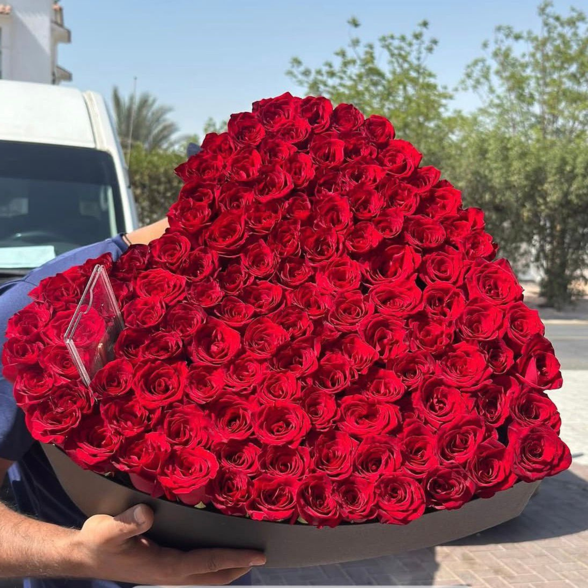 100 fresh red roses luxury black heart box ultimate romantic gift same-day delivery Dubai AED 520 Flowerdxb