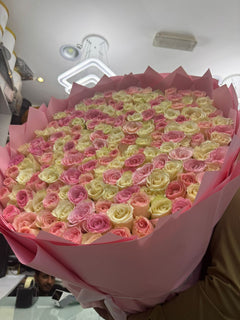 200 mixed pink and white roses in pink wrapping luxury bouquet, same-day delivery Dubai Flowerdxb