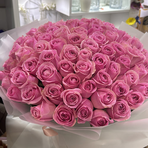 100 Pink Roses Hand Tied Bouquet – Transparent Wrap