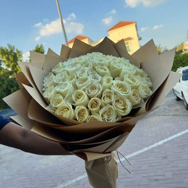 50 White Roses – Brown Wrapping | Rustic Luxury Bouquet | Same-Day Delivery Dubai | Flower DXB