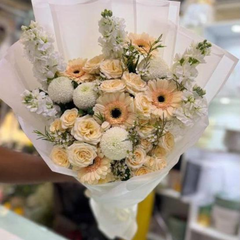 Peach Baby Roses, Gerbera & White Mathiola Bouquet Duba